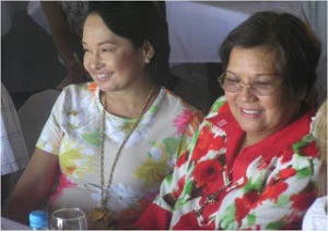 Sally Lee (left) with then President Gloria Macapagal-Arroyo. Photo credit